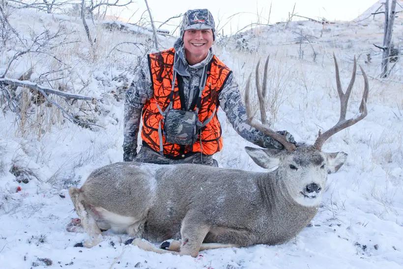 Brad tribby with his mule deer buck