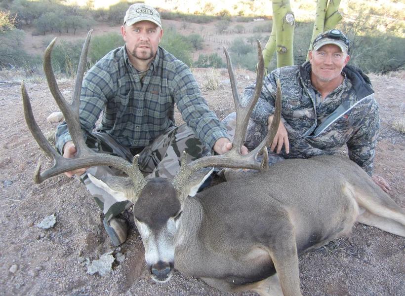 Greg kroghs client with a giant mule deer buck