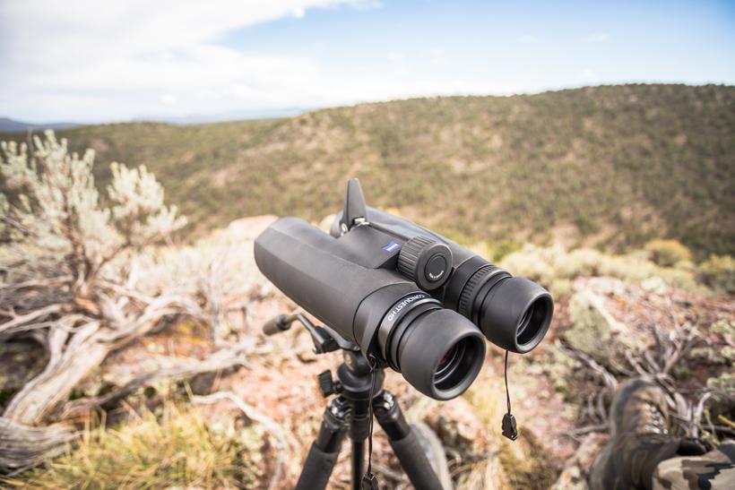 15x binoculars mounted to a tripod