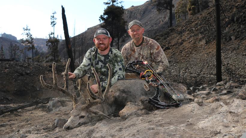 Zach kenner and father with his archery velvet mule deer