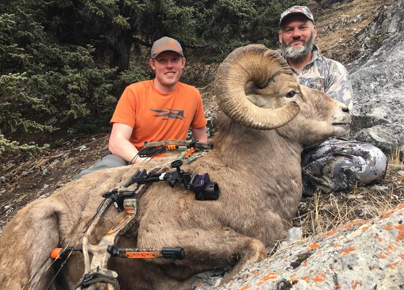 Nathan french and client with a rocky mountain bighorn sheep