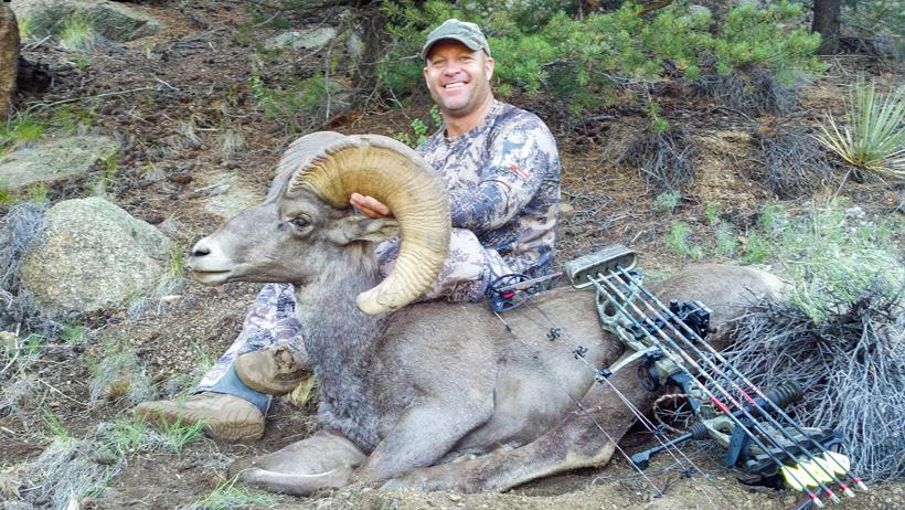 Pat Loescher with an archery Colorado bighorn sheep