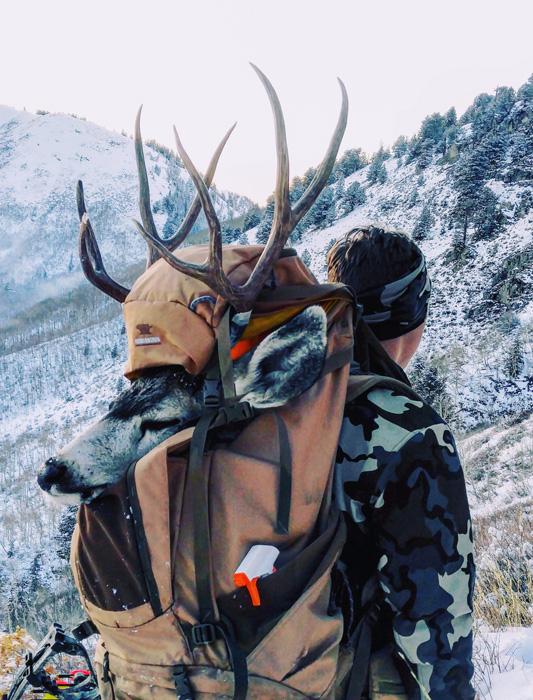 Zach davis packing out his utah archery mule deer