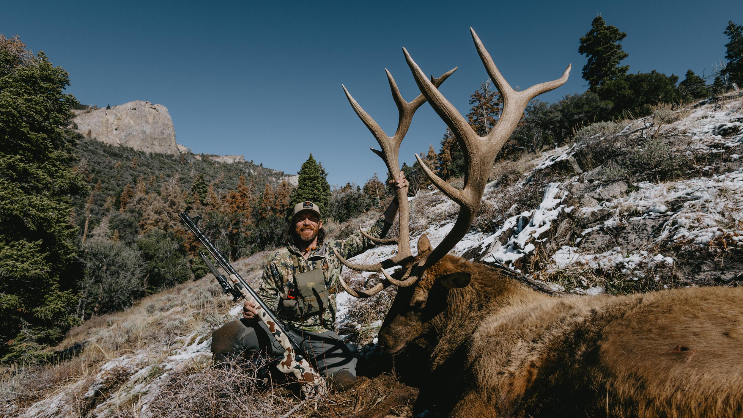 Brady Miller with his 2023 muzzleloader bull elk with Arrowhead muzzy and Revic EXO sight