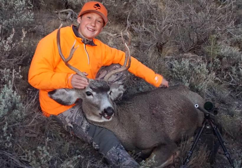 Trails son with his first mule deer taken in utah