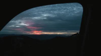 Arizona sunrise viewed from the seat of a vehicle