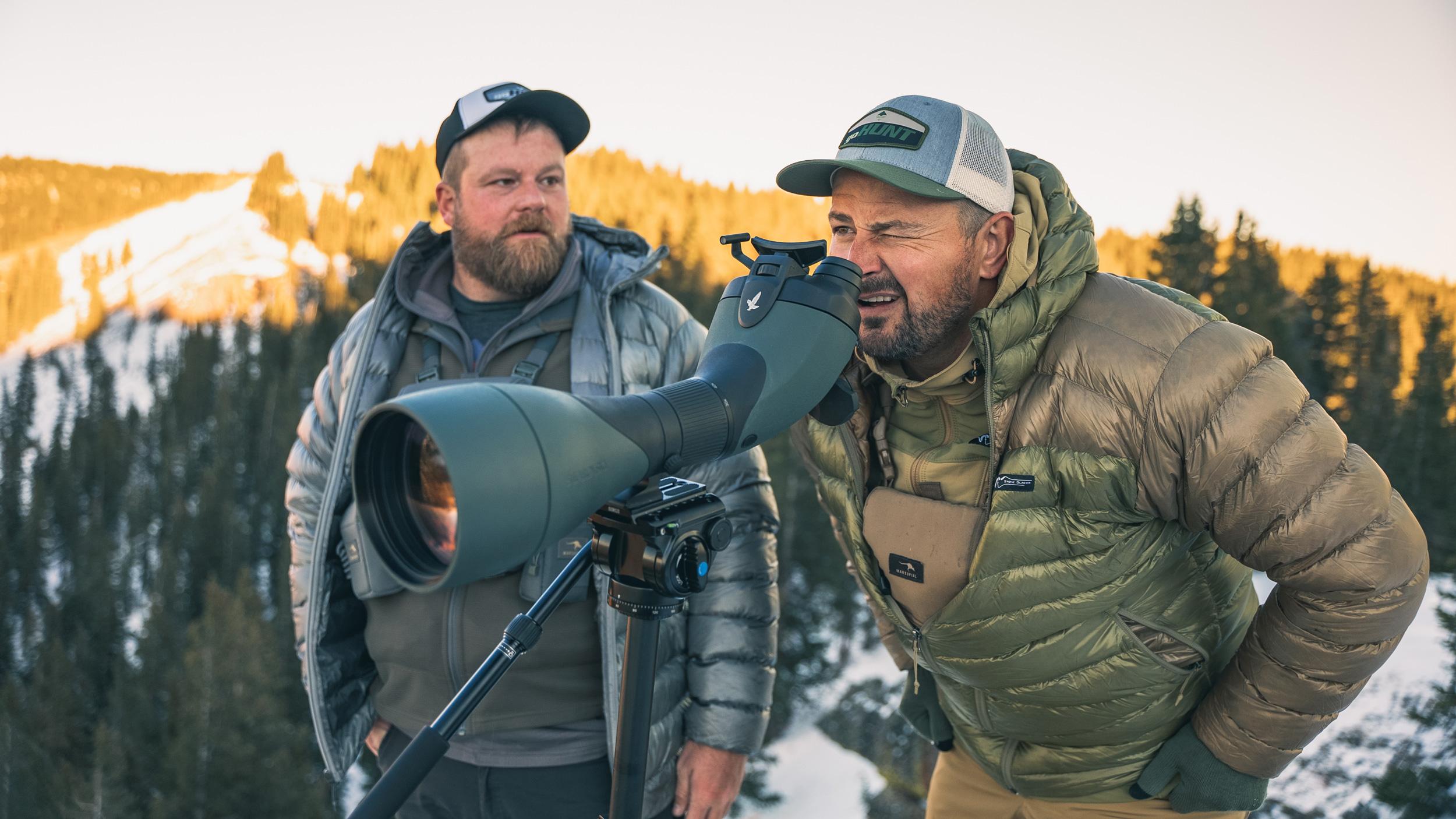 Glassing for mule deer in Stone Glacier Grumman Goose Down Jacket