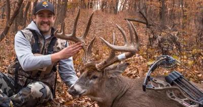 Chris neville with giant archery whitetail buck 1