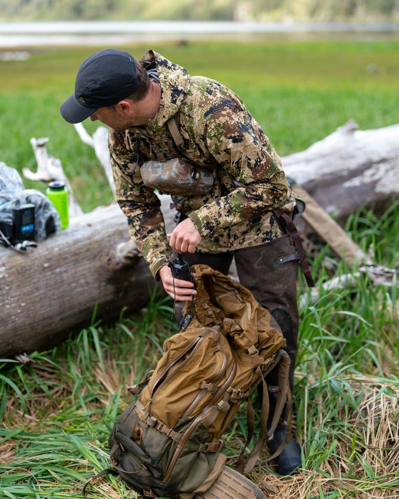 Trail Kreitzer loading up Kifaru Absaroka hunting backpack