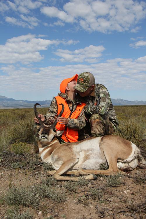 Taylor and her dad with the antelope