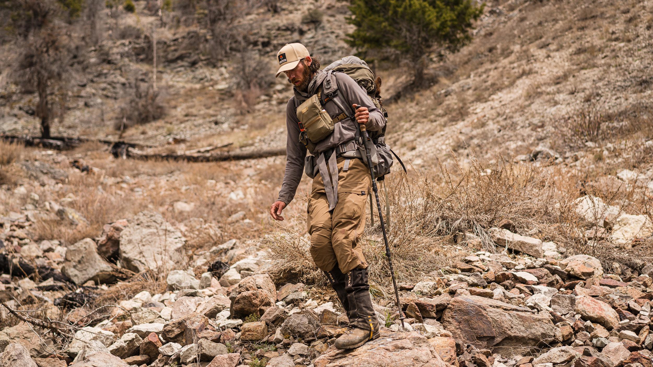 Brady Miller packing out black bear using Peax trekking poles