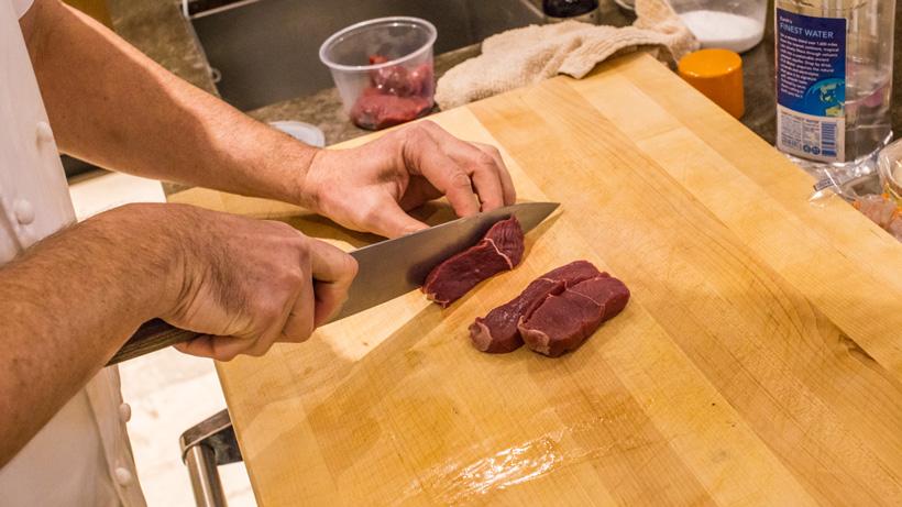 Cutting the elk meat