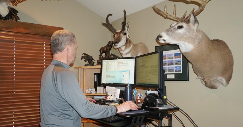 Randy Newberg doing some computer scouting for an elk hunt
