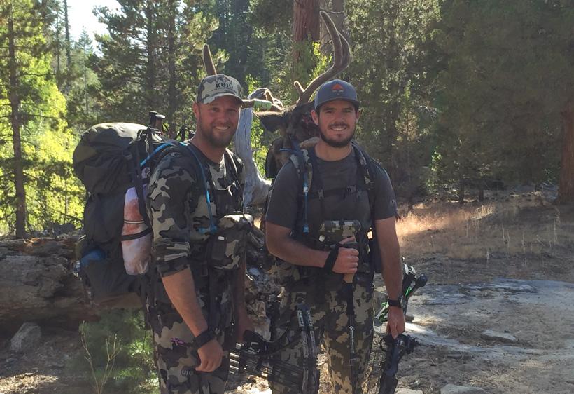 Travis stone and brett packing out a california archery blacktail buck