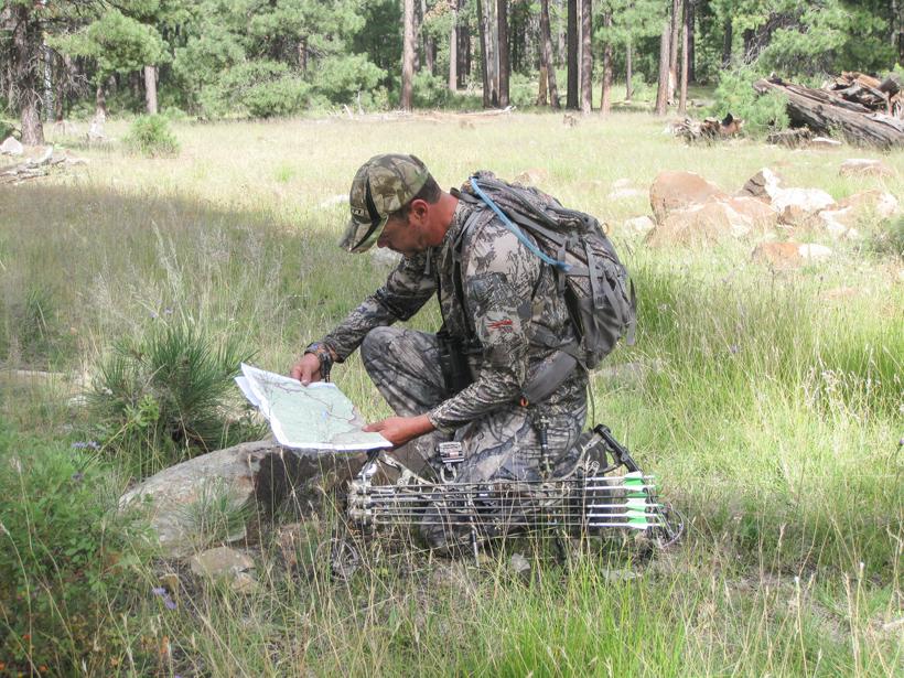Checking out a map on an elk hunt