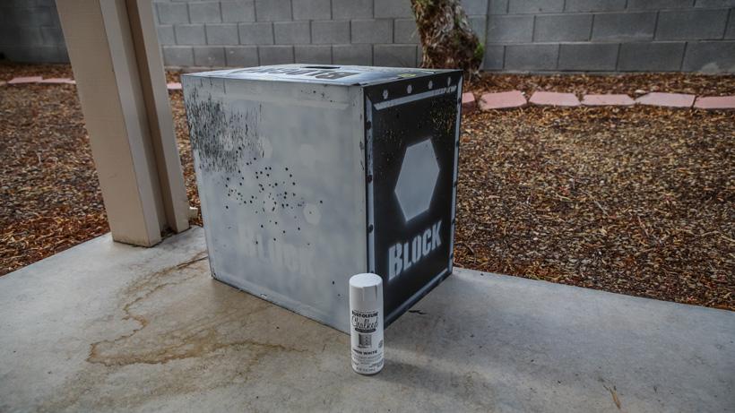 Spray painting target white for target panic cure