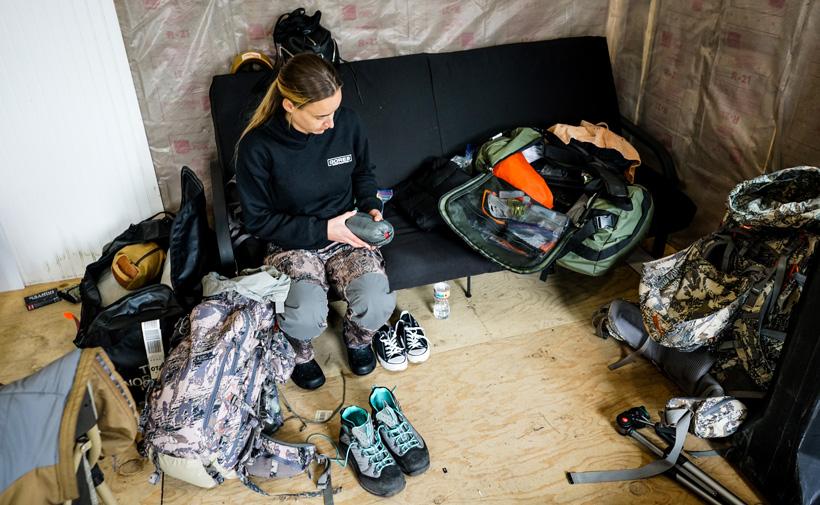 Organizing gear for the caribou hunt