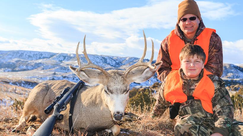 Bubba king with his first mule deer buck