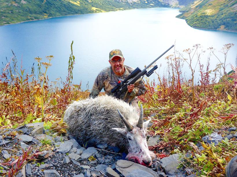 Tyler lisonbees dad with a british columbia mountain goat