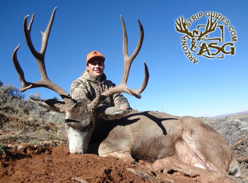 Christopher wright with his kaibab mule deer taken with arizona strip guides