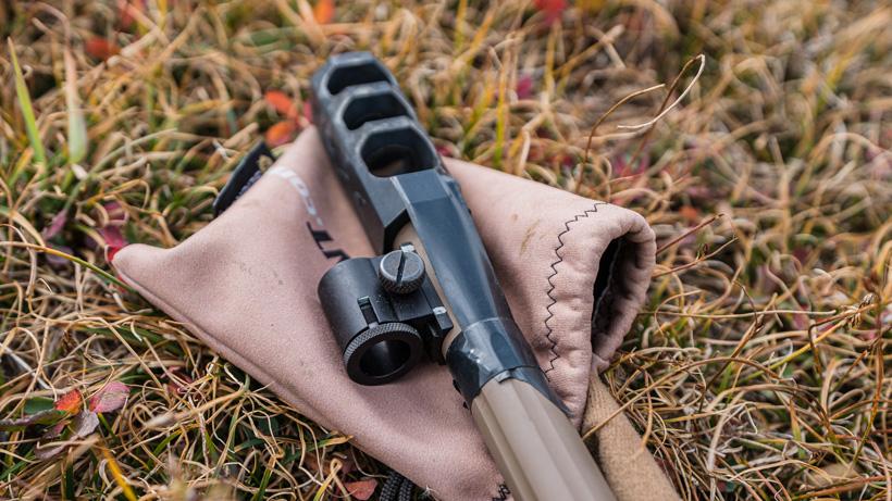 Taped muzzleloader brake and gun sleeve to prevent debris down the barrel