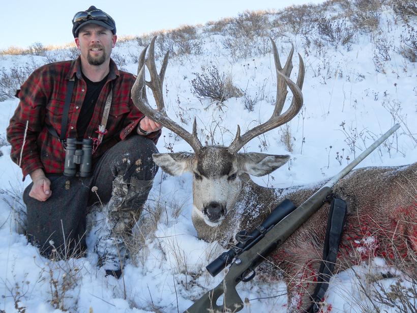 Jake ingram with a great montana mule deer buck