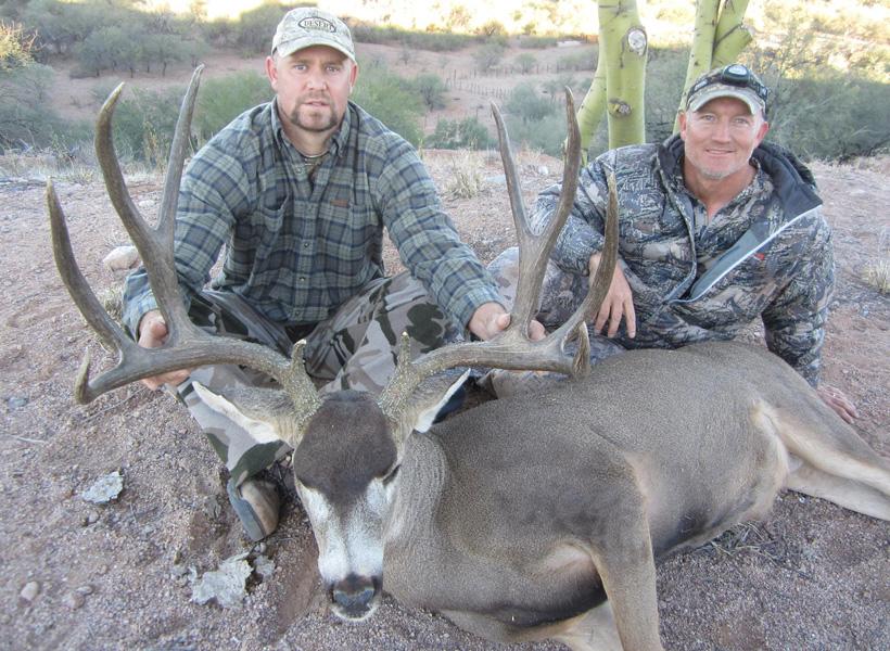 Greg kroghs client with a giant mule deer buck
