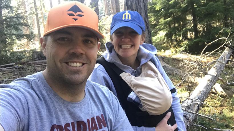 Husband and wife posing during hunt