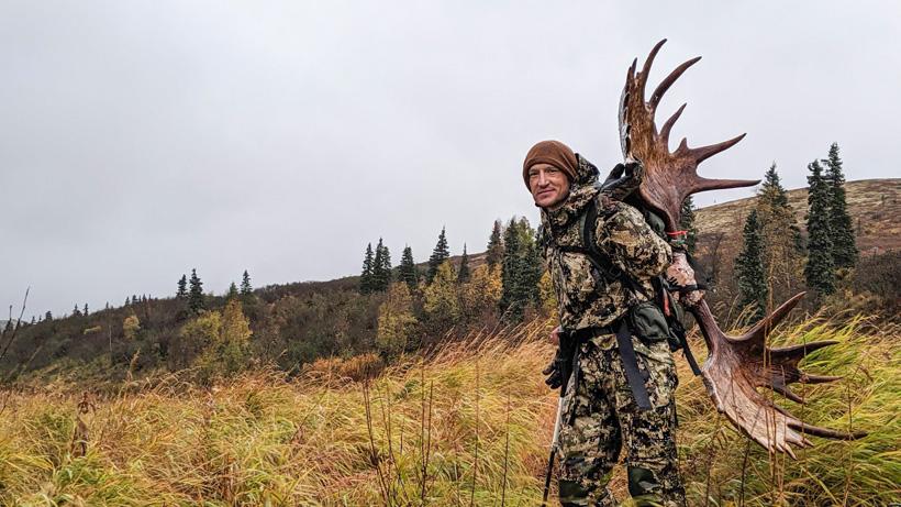 Trail packing moose with stone glacier pack