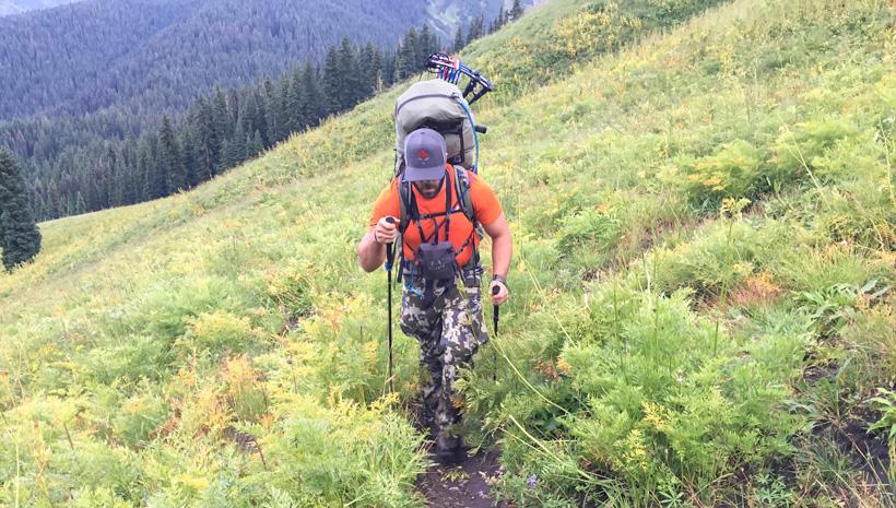 Lorenzo sartini hiking with trekking poles while hunting_0