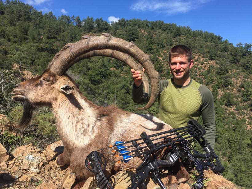 Cam foss with an archery ibex taken in asia