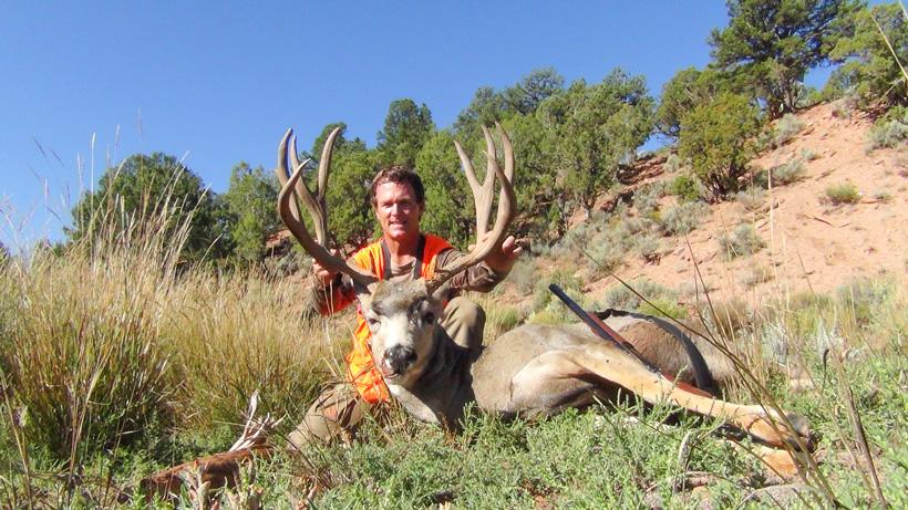 Robby denning with a seven year old colorado mule deer