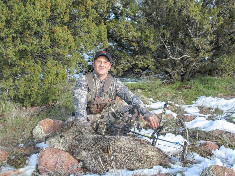 Kody smith with his arizona javelina