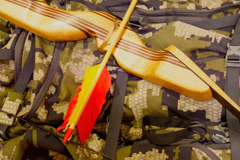 Recurve bow with flu flu arrow