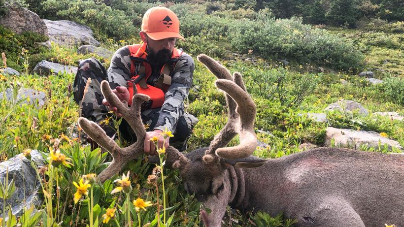Aaron oglesby with his colorado mule deer