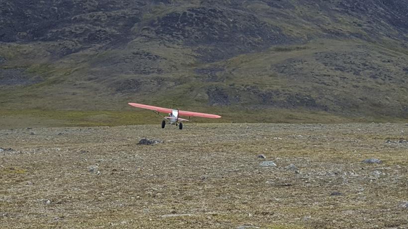 Plane landing to pick up hunting gear