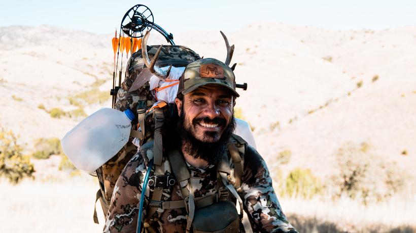 Packing out an archery buck