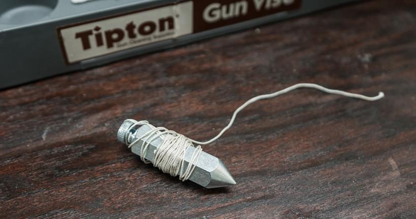 Plumb bob for truing riflescope