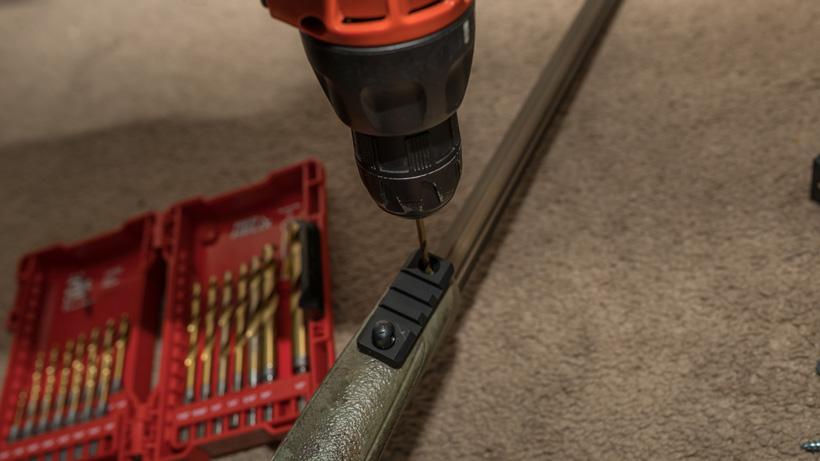 Drilling hole in rifle for picatinny rail