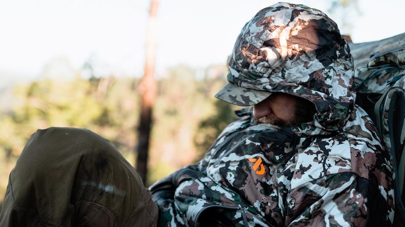 Taking nap on a backpack hunt