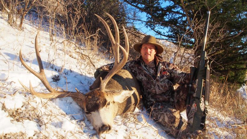 Robby denning with a seven year old lab aged idaho mule deer