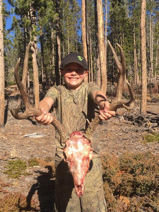 All smiles for a young hunters first deer
