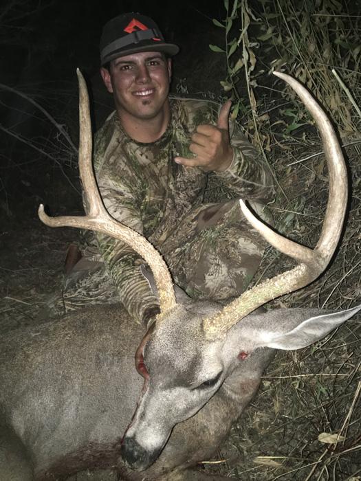 Gage with his california blacktail buck