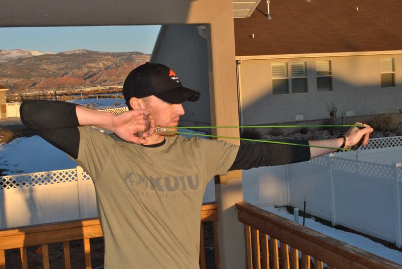 Full draw with backtension training device